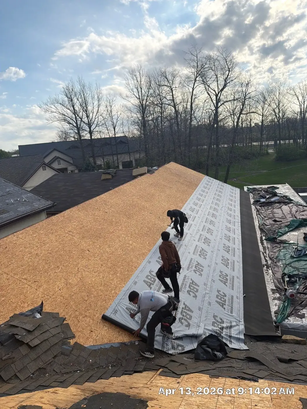 Tarping and dry-in on a Worthington commercial roof